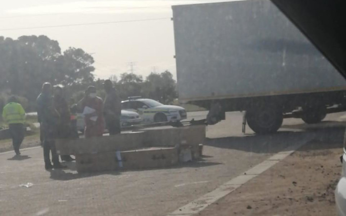Officials: Some of the 106 bodies in overloaded truck died from COVID-19